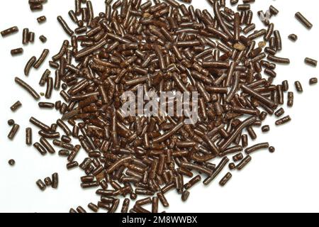 Sweet chocolate sprinkles on white background Stock Photo