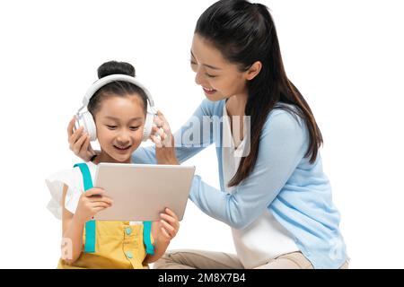 A young female teacher counseling students learning Stock Photo