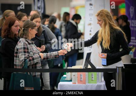 Vancouver, Canada. 15th Jan, 2023. People line up for the gluten-free drink samples at the Gluten Free Expo in Vancouver, British Columbia, Canada, on Jan. 15, 2023. Credit: Liang Sen/Xinhua/Alamy Live News Stock Photo
