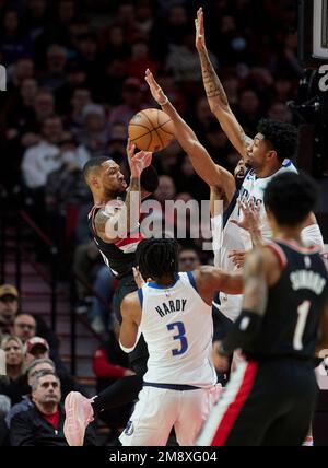 Dallas Mavericks guard Jaden Hardy, right, shoots as Los Angeles Clippers  center Moses Brown during the first half of an NBA basketball game Tuesday,  Jan. 10, 2023, in Los Angeles. (AP Photo/Mark
