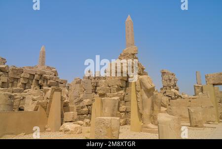 Temple ruins with 2 obelisks in the temple area of Thutmosis III, Karnak Temple, Karnak, Egypt Stock Photo