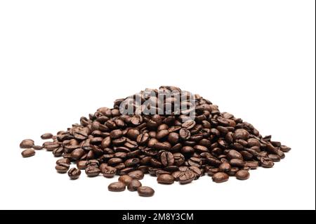 A pile of freshly roasted coffee beans. Stock Photo