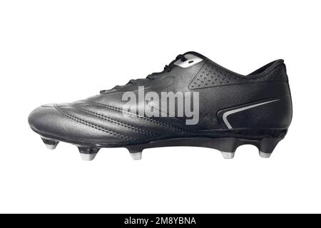 Black modern soccer boots isolated on white background. Leather football boot isolated. Professional athletics training shoes. Sports shoes. Stock Photo