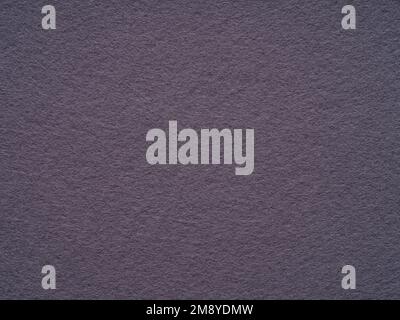 Violet, lilac dark felt, soft material blank texture. Surface of felted fabric texture abstract background. Pattern for text, lettering, patchwork or Stock Photo
