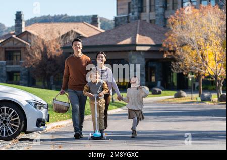 A young couple with children here Stock Photo