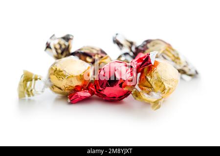 Sweet candy wrapped in foil isolated on the white background. Stock Photo