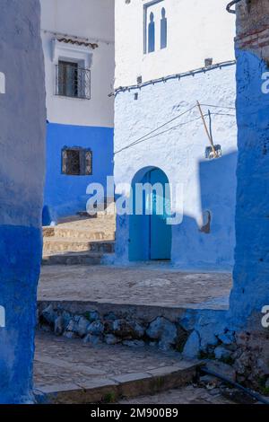Winding streets in the beautiful city of Chefchaouen in Morocco. Also known as Chaouen or The Blue Pearl, Blue City or شفشاون الجوهرة الزرقاء . Stock Photo