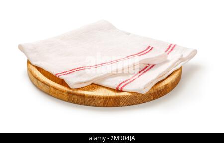 Napkin and board for pizza on white background. White napkin on wooden round board isolated. Stock Photo