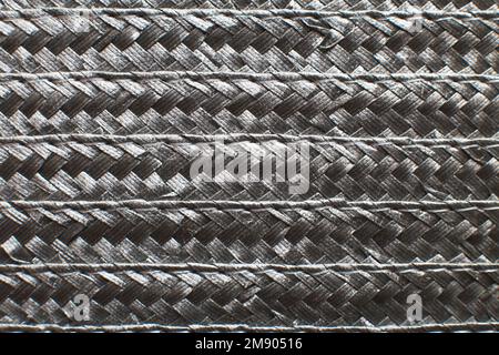 Black textured surface of wicker woven basket. Stock Photo