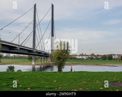 A closeup of the Oberkasseler Bridge over the Rhine river in Dusseldorf, Germany Stock Photo