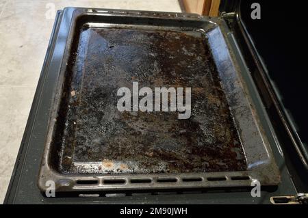 dirty oven baking tray at kitchen Stock Photo