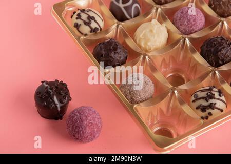Photo of many chocolates in one box in close-up Stock Photo