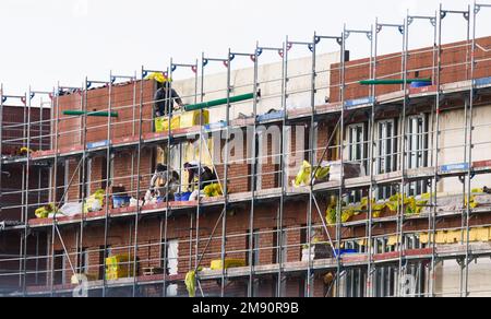 Hanover, Germany. 16th Jan, 2023. Apartment buildings with thousands of apartments are being built in the Kronsrode development area. The German construction industry is pessimistic about the future and is preparing for a drop in sales in 2023. (To dpa 'Construction industry pessimistic for the future - real sales decline in 2023') Credit: Julian Stratenschulte/dpa/Alamy Live News Stock Photo