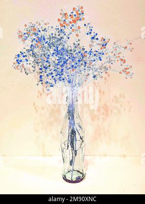 Abstract view of dry and wilted flowers in a vase on white background Stock Photo