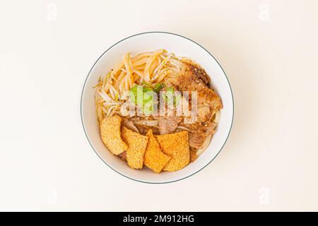 Cao Lau Hoi An, Vietnamese rice noodle with pork, Vietnamese food isolated on white background, top view Stock Photo