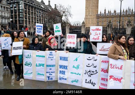 On January 14th 2023 a group of Afghan women demonstrate in Parliament Square demanding education and freedom for women in Afghanistan. Stock Photo