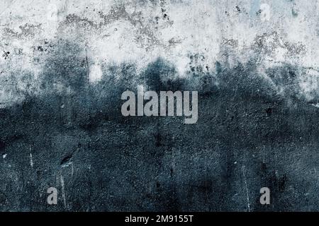 Old damaged burned wall with rough grunge texture Stock Photo