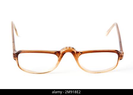 Old eyeglasses isolated on the white background Stock Photo