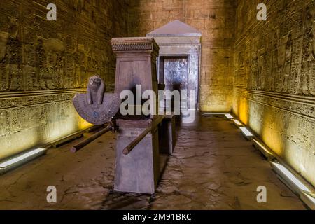 EDFU, EGYPT - FEB 17, 2019: Shrine with a barque in the temple of Horus in Edfu, Egypt Stock Photo