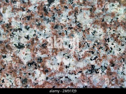 the red granite, stone natural texture polished surface Stock Photo