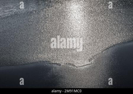 Frozen lake, structures of the water surface Stock Photo - Alamy