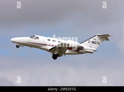 A Cessna 510 Citation Mustang departs Brighton City Airport Sussex Stock Photo