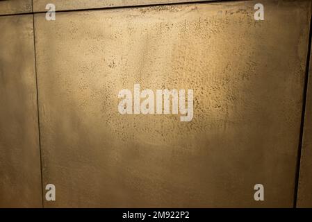 close up of golden wall at reception in luxury hotel,stock image Stock Photo