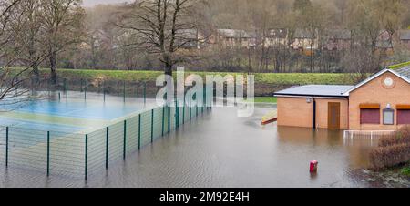 Taffs Well, Cardiff, Wales - January 2023: Village tennis court underwater after flooding from the River Taff Stock Photo