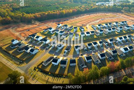 Aerial view of construction site with new tightly packed homes in South Carolina. Family houses as example of real estate development in american Stock Photo
