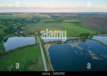 Aerial view of fish hetching pond with blue water in aquacultural area Stock Photo