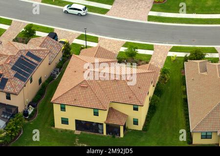 Aerial view of typical contemporary american private house with roof top covered with ceramic shingles and double garage Stock Photo