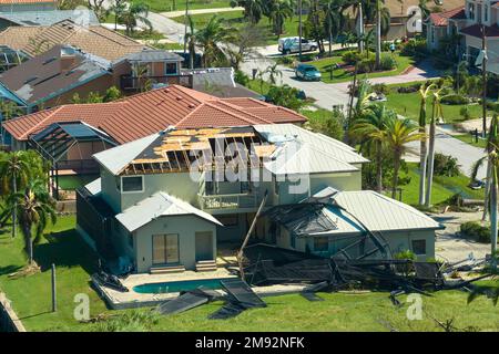 Hurricane Ian destroyed swimming pool lanai enclosure on house yard in ...