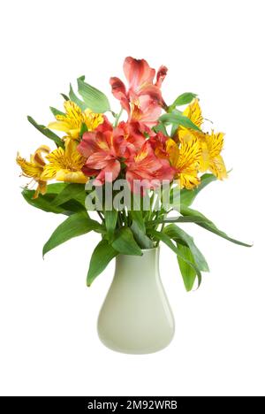 Bunch of alstroemeria flowers in a vase isolated on white Stock Photo