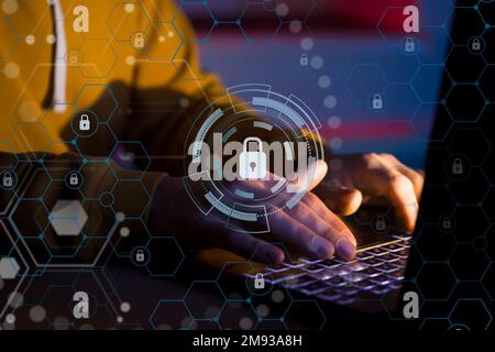 Man works on a laptop online, hands closeup. Stock Photo