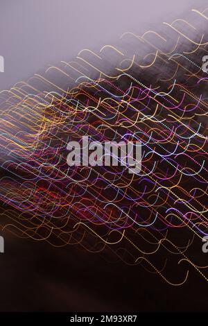Random fantasy multi-coloured light effect created in a single exposure. Stock Photo
