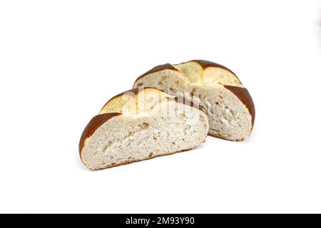 Freshly baked traditional German laugenbrot. Bavarian homemade pretzel rolls lye bread, close-up, isolated on white background. Stock Photo