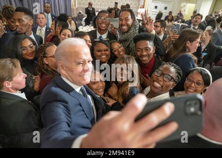 Washington, United States Of America. 16th Jan, 2023. Washington, United States of America. 16 January, 2023. U.S President Joe Biden, takes a selfie with attendees during the National Action Network annual Martin Luther King Day breakfast at the Mayflower Hotel, January 16, 2023 in Washington, DC Credit: Adam Schultz/White House Photo/Alamy Live News Stock Photo
