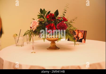 wedding venue tables flowers alcohol reception celebration candles Stock Photo