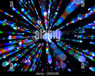 Colorful abstract circles in a radiating pattern against a black background Stock Photo