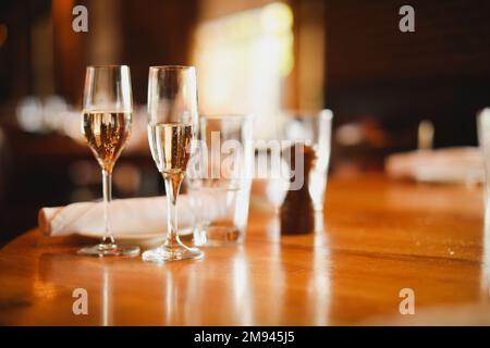 wedding venue tables flowers alcohol reception celebration candles Stock Photo