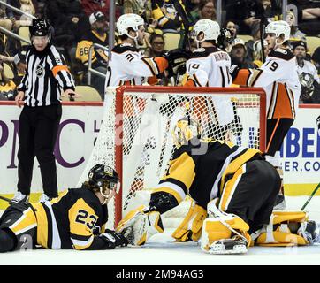 Anaheim Ducks center Mason McTavish (23) carries the puck around Utah ...