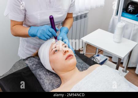 Cosmetologist making mesotherapy injection, mesotherapy injection Stock Photo