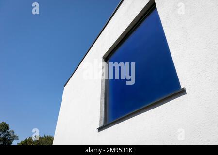 Energy-efficient double-glazed window in a window on the facade of a modern house Stock Photo