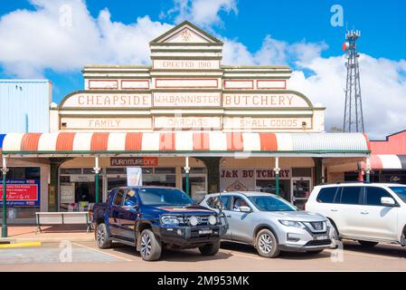 Cars parked ourtside the 1910 erected Cheapside Butchery in the main  street of Cobar in western New South Wales, Australia Stock Photo