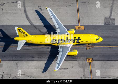 Los Angeles, United States - November 4, 2022: Spirit Airbus A320 airplane at Los Angeles airport (LAX) in the United States aerial view. Stock Photo