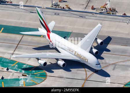Los Angeles, United States - November 4, 2022: Emirates Airbus A380-800 airplane at Los Angeles airport (LAX) in the United States aerial view. Stock Photo