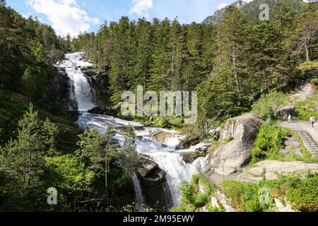 Cauterets (south-western France): waterfall of the stone-built bridge “Pont d’Espagne” over the mountain stream “gave de Gaube”. This natural tourist Stock Photo