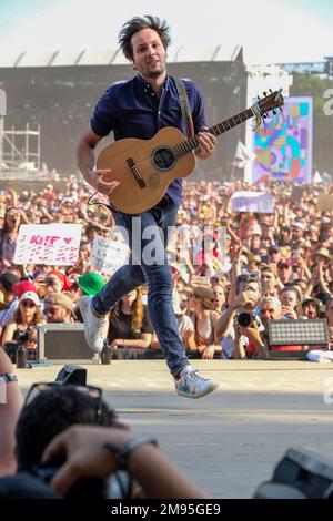 Carhaix (Brittany, north-western France), July 17, 2022: singer Vianney on stage and crowd of festival-goers on the occasion of the Vieilles Charrues Stock Photo