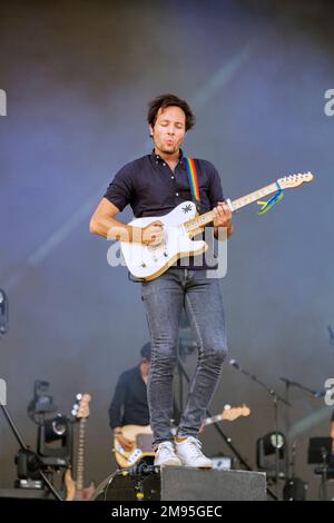 Carhaix (Brittany, north-western France), July 17, 2022: singer Vianney on stage and crowd of festival-goers on the occasion of the Vieilles Charrues Stock Photo