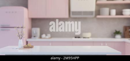 https://l450v.alamy.com/450v/2m95hpp/modern-white-kitchen-tabletop-with-flower-vase-decor-and-copy-space-for-your-product-display-over-blurred-beautiful-pastel-pink-kitchen-interior-styl-2m95hpp.jpg